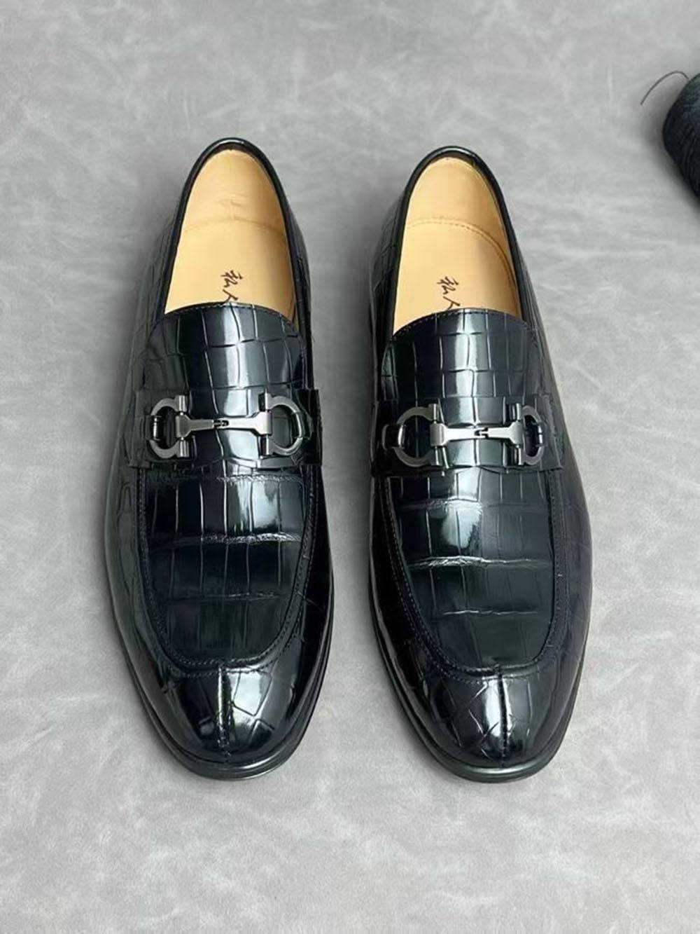 Black crocodile leather men's penny loafer dress shoes by Rossie Viren, showcasing the textured crocodile pattern and sleek design.