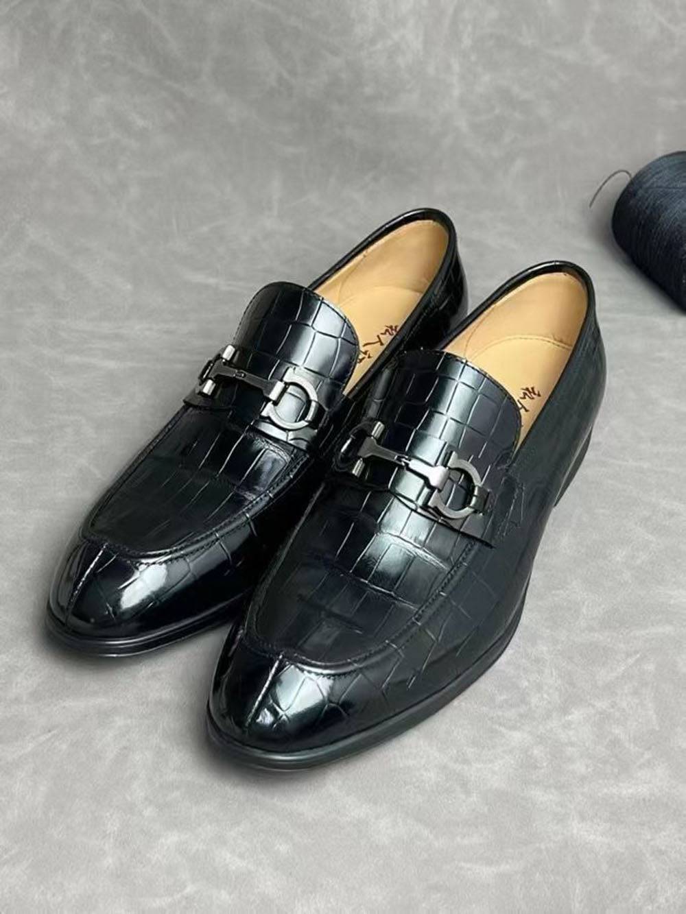 Black crocodile leather men's penny loafer dress shoes by Rossie Viren, featuring detailed textured crocodile pattern and polished finish.