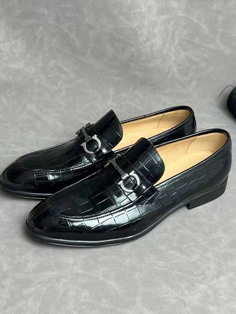 Black crocodile leather men's penny loafer dress shoes by Rossie Viren, showing the textured crocodile pattern and sleek design.