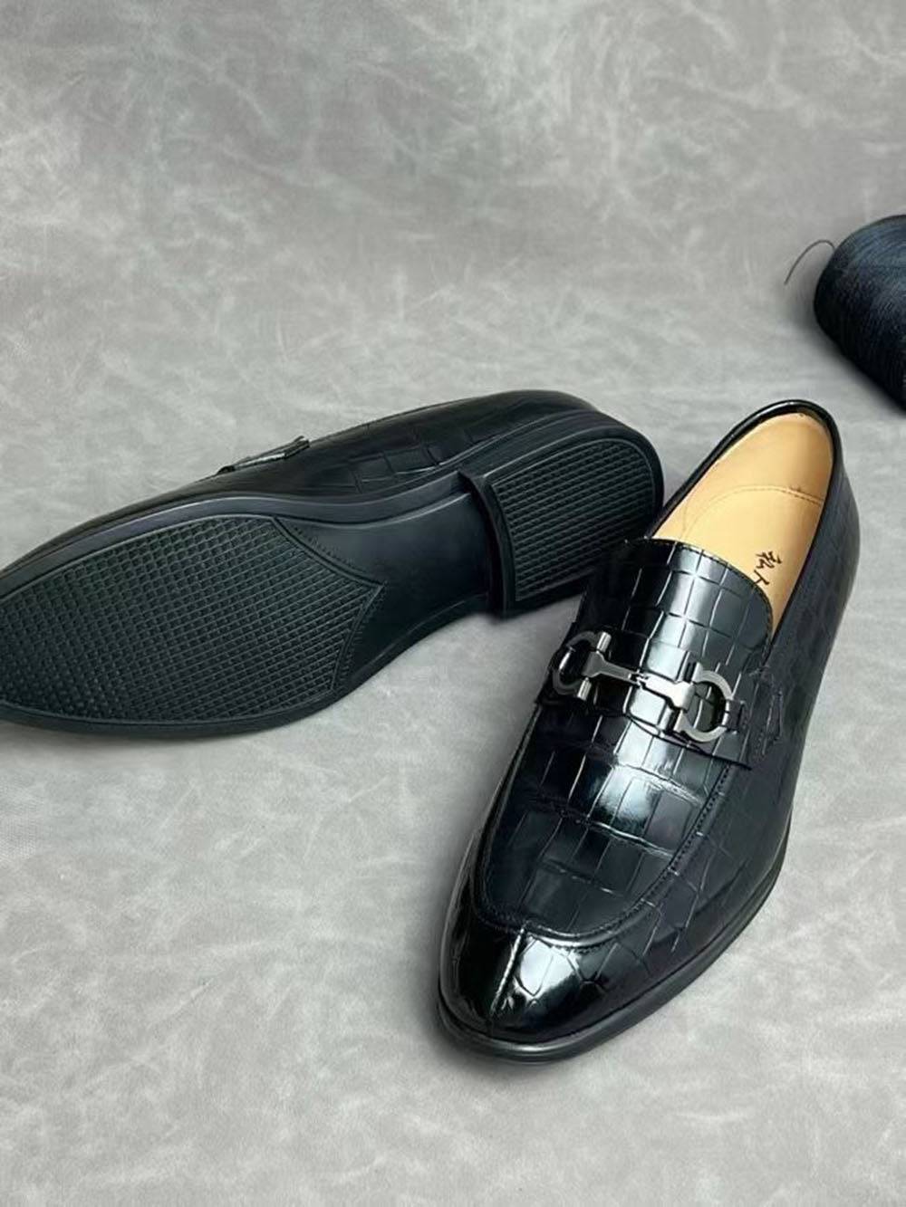 Black crocodile leather men's penny loafer dress shoes by Rossie Viren, showing the textured crocodile pattern and sleek design.
